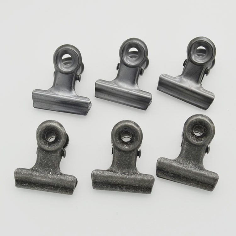 Los fabricantes suministran un gran número de en stock 22mm ronda clip Bill clip metal archivo hierro clip muestra gratis
