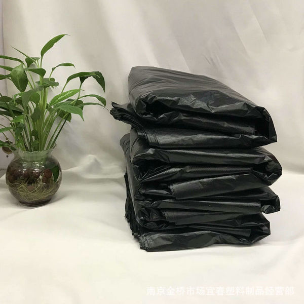 Big black plastic disposable garbage bag