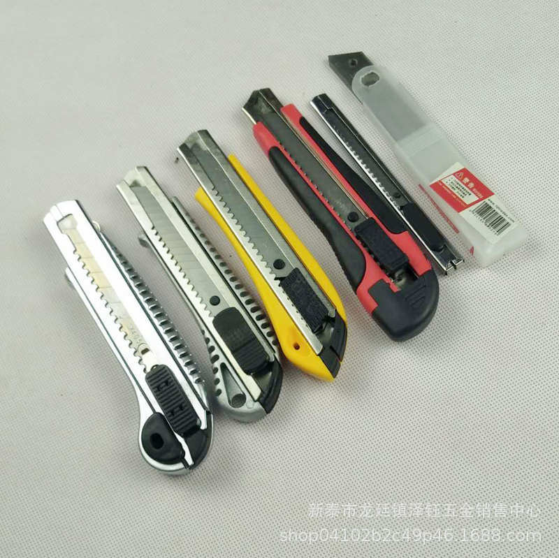 Fábrica al por mayor arte cuchillo titular corte papel cuchillo pieza desembalaje papel pintado cuchillo bloqueo automático anillo cuchillo alta calidad y bajo precio