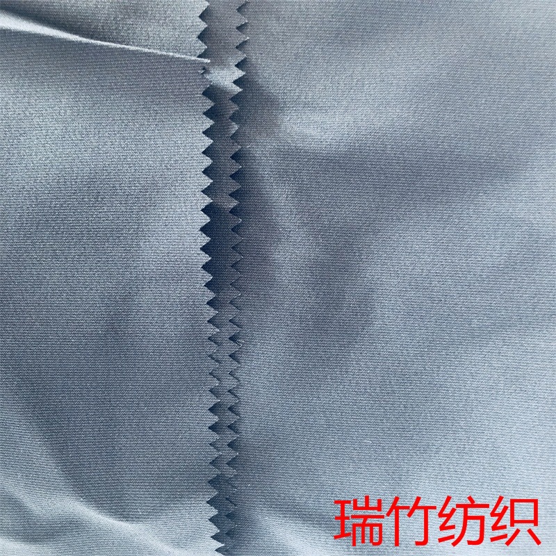 厂家供应75D阳离子变化斜纹四面弹 阳涤四面弹面料复合摇粒绒布料