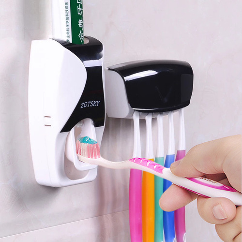 Creative wall-mounted toothbrush holder automatic toothpaste squeezer set bathroom toilet toothbrush storage stand without punching