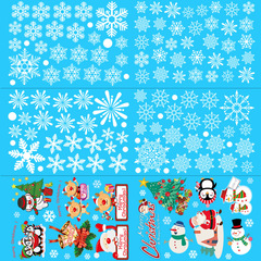 クリスマスのステッカーの壁に静電気のショーウインドーのガラスを貼って雪の花の老人のシーンを描いて道具のクリスマスの装飾品を配置します。