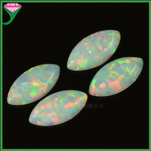 外贸Op17人造幻彩白色火澳宝马眼形平底素面裸石 凸卜面马眼欧泊