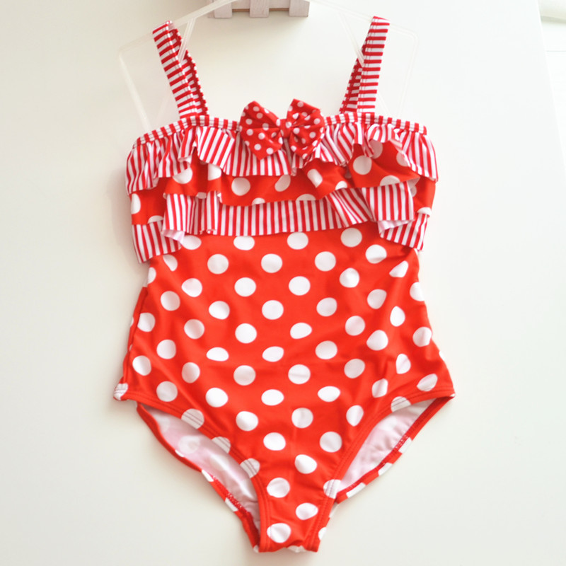 Red polka dot pleated one-piece