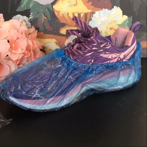 Manufacturer wholesale disposable shoe covers PE plastic shoe covers dustproof waterproof rainproof shoe foot covers 100 pieces
