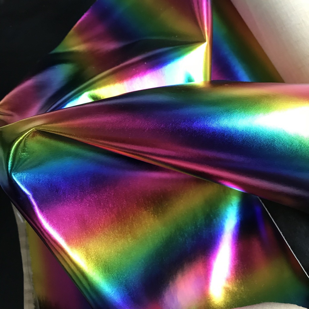 厂家直销超软PU金属幻彩101贴膜皮革面料 文具手袋服装帽子装饰革