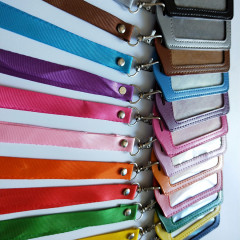 1.5-inch wide metal fastener with rivets, polyester lanyard, matching leather card holder for ID badge