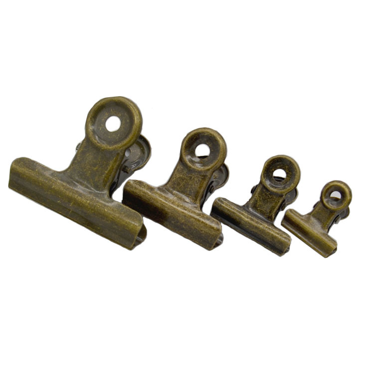 Los fabricantes suministran un gran número de en stock 22mm ronda clip Bill clip metal archivo hierro clip muestra gratis