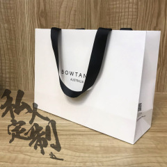 白い紙詰まり袋ショッピング洋服店化粧品手提げ紙袋定logoギフト袋手提げ袋高級感