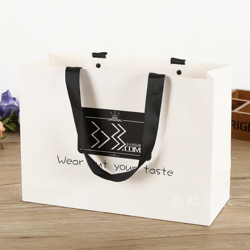 铆钉加固服装手提袋 白卡黑卡牛皮纸创意彩色服装包装礼品袋