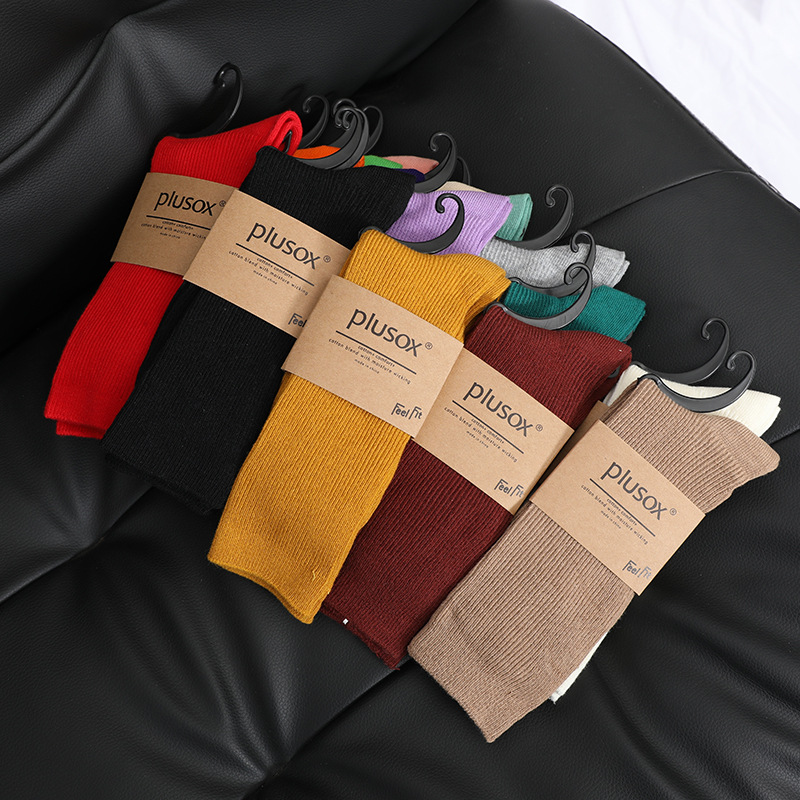 Venta al por mayor calcetines de pila de mujer nueva japonesa otoño color sólido calcetines de algodón de longitud media calcetines de color caramelo de aguja doble de mujer