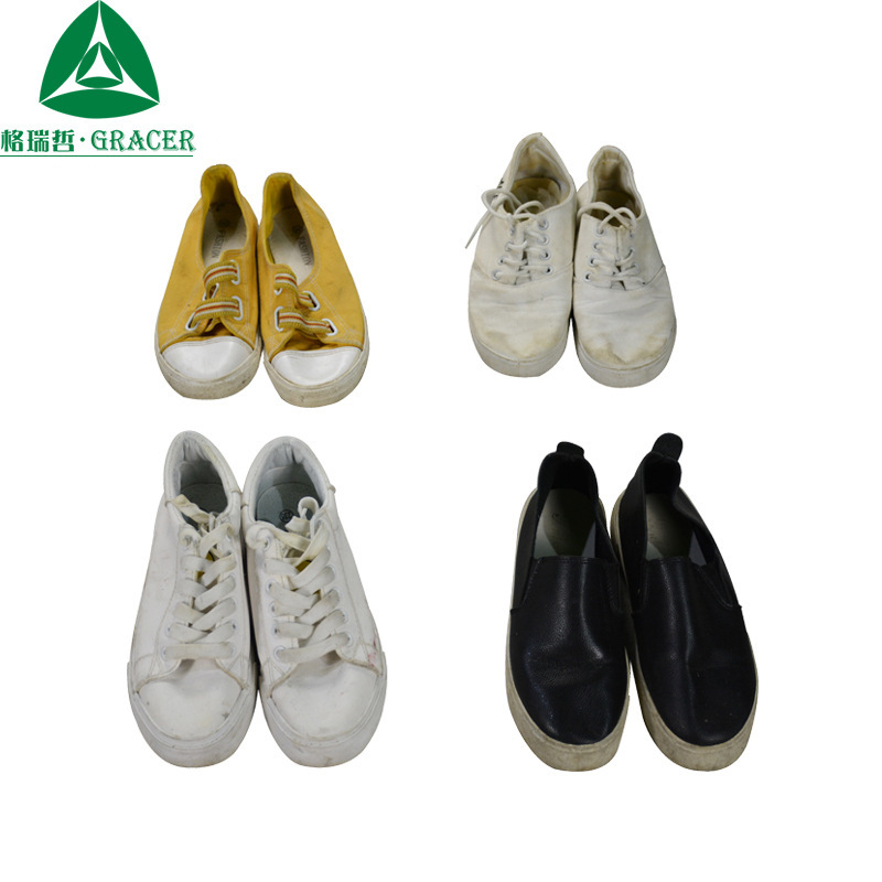 Old Shoes and Old Clothes Manufacturers Stock Women's Sneakers for Sale in a Whole Cabinet. Miscellaneous Items, Various Versatile Running Sneakers