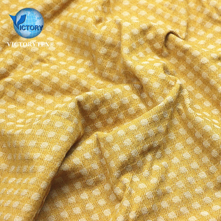 时尚女服装裙子面料针织纬编弹力涤纶棉色织菱形格移圈大提花布