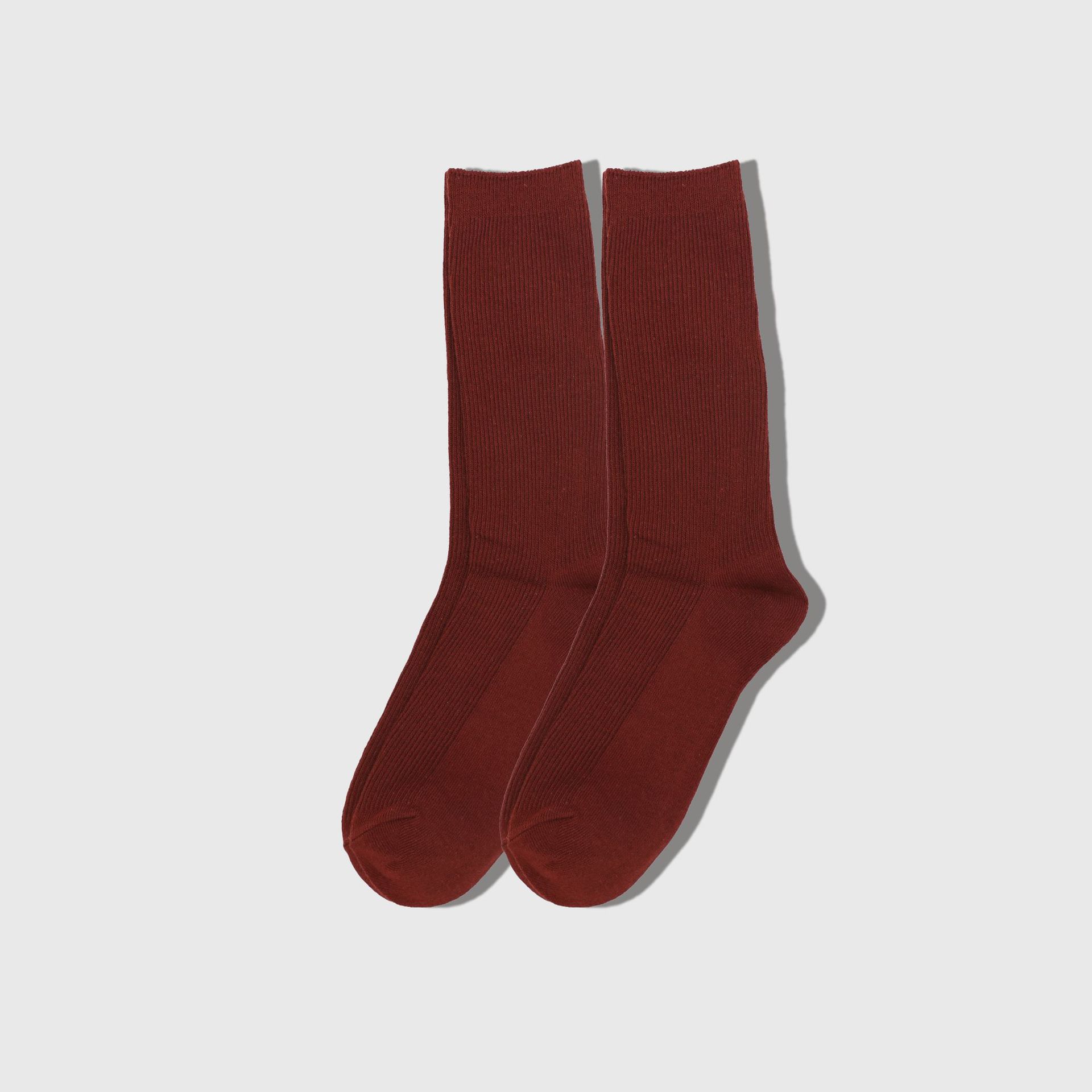 Venta al por mayor calcetines de pila de mujer nueva japonesa otoño color sólido calcetines de algodón de longitud media calcetines de color caramelo de aguja doble de mujer