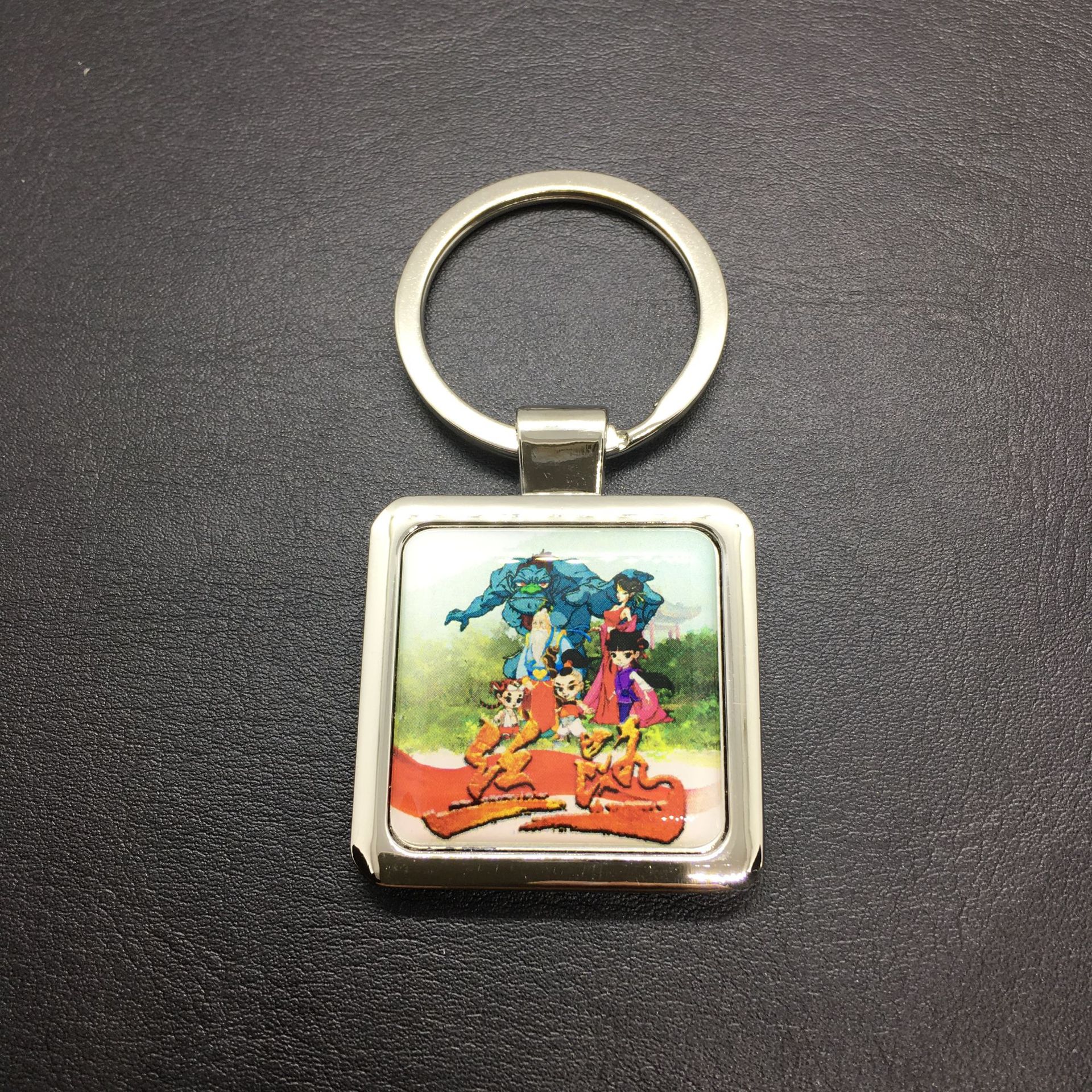 Fabricante de pegatinas de dibujos animados, llaveros de aleación de zinc epoxi, llaveros metálicos con logotipo, pequeños regalos colgantes para obsequios.