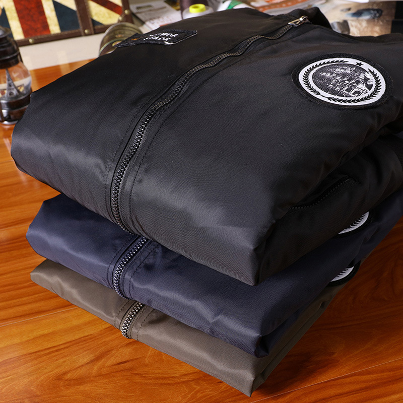 Amazon otoño nueva chaqueta de los hombres del collar del soporte uniforme de béisbol juventud moda Coreana de la Fuerza Aérea uniforme de vuelo de los hombres chaqueta