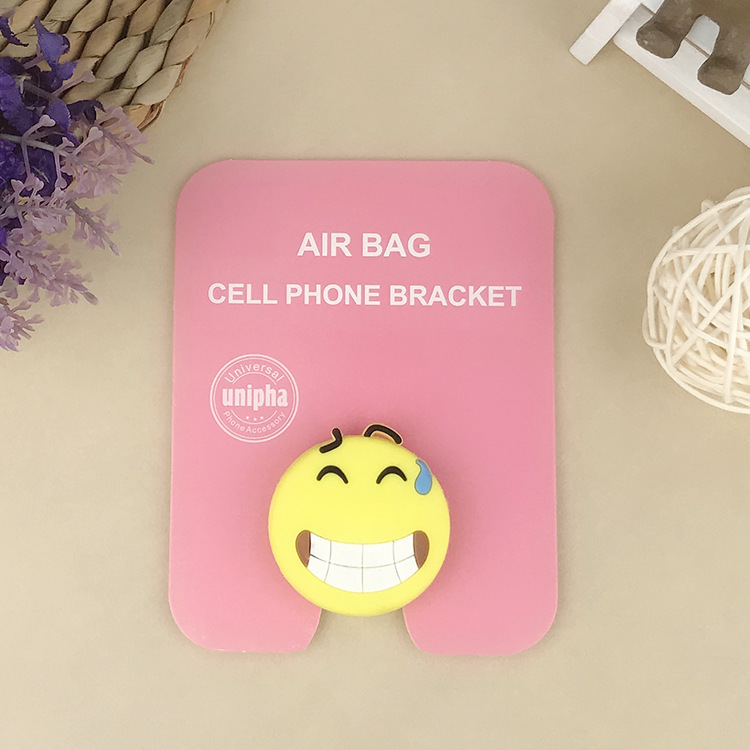En stock al por mayor TikTok Cartoon creativo soporte de teléfono móvil puede soportar airbag soporte de teléfono móvil soporte de escritorio