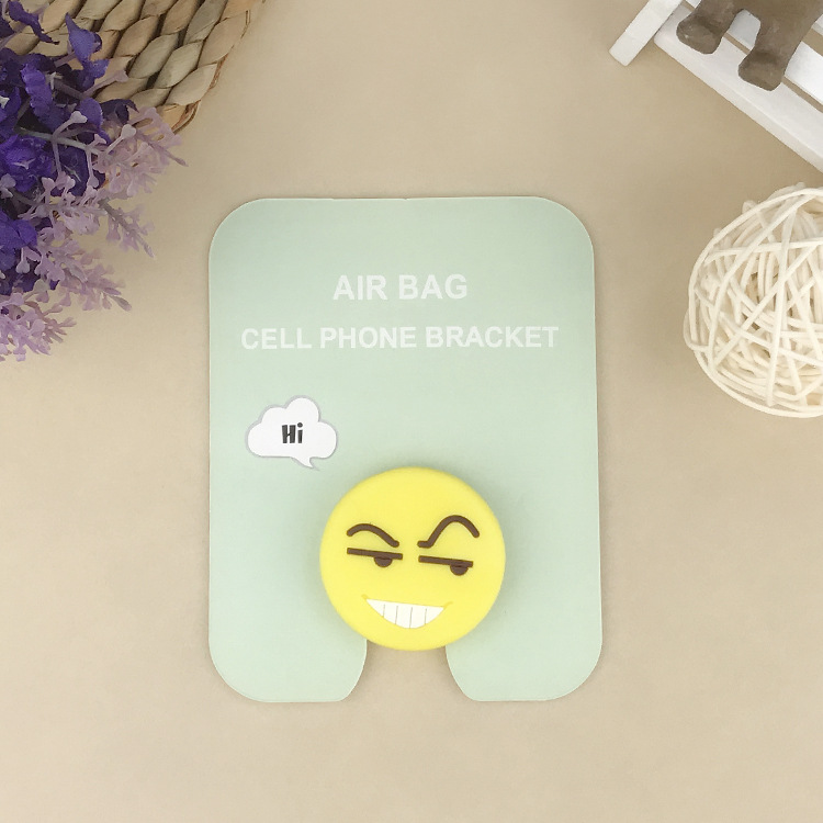 En stock al por mayor TikTok Cartoon creativo soporte de teléfono móvil puede soportar airbag soporte de teléfono móvil soporte de escritorio