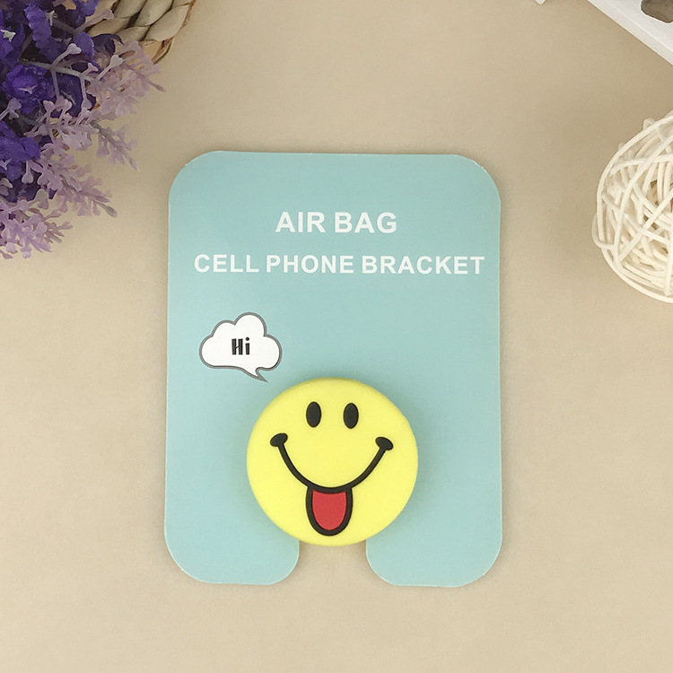 En stock al por mayor TikTok Cartoon creativo soporte de teléfono móvil puede soportar airbag soporte de teléfono móvil soporte de escritorio