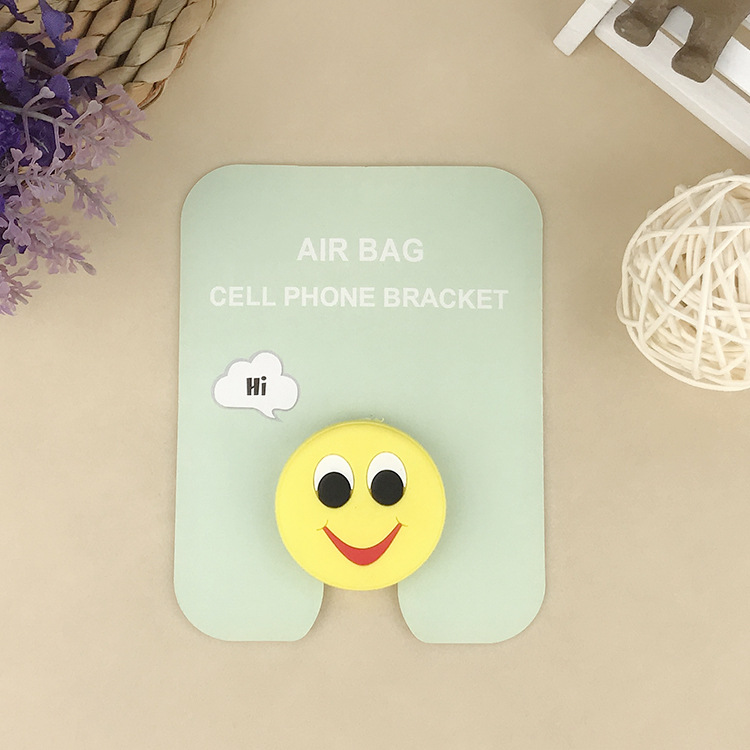 En stock al por mayor TikTok Cartoon creativo soporte de teléfono móvil puede soportar airbag soporte de teléfono móvil soporte de escritorio