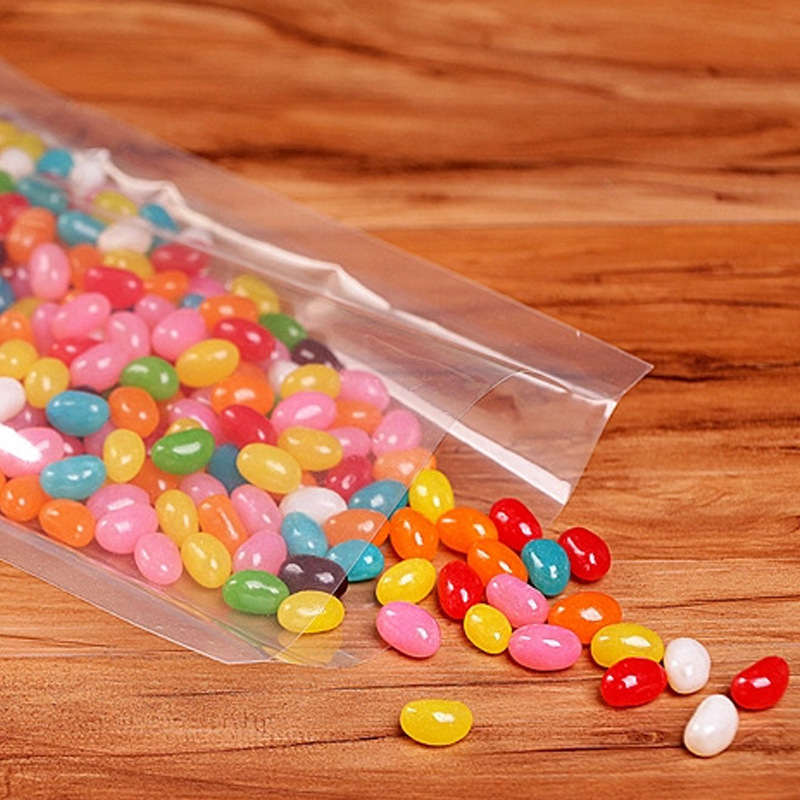 Bolsa transparente de envasado al vacío de aperitivos bolsa de envasado de alimentos de mariscos arroz productos secos fabricante de bolsas de sellado de tres lados en stock