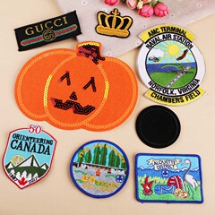 Embroidered patch with a pumpkin head design, personalized DIY computer embroidery, no adhesive back, for clothing decoration and patchwork.