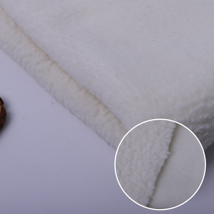 厂家直供全涤纬编白色单面羊羔绒面料 保暖加厚服装家纺玩具绒布