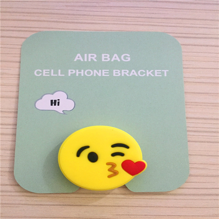 En stock al por mayor TikTok Cartoon creativo soporte de teléfono móvil puede soportar airbag soporte de teléfono móvil soporte de escritorio