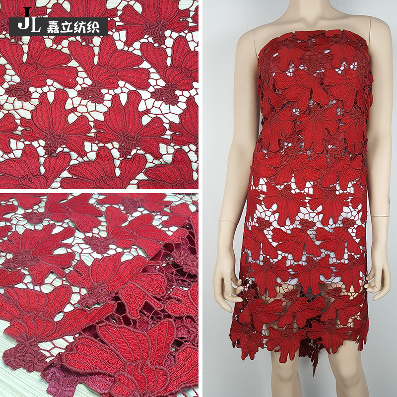 水溶镂空牛奶丝绣花面料酒红色重工刺绣满幅花边女装连衣裙布料