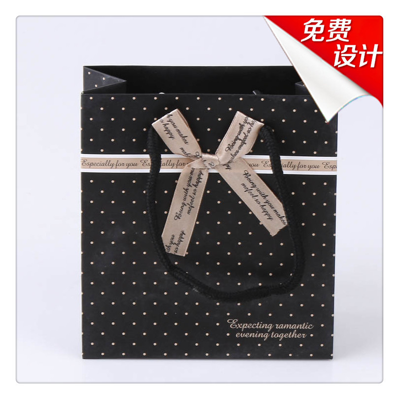 厂家促销 各种蝴蝶结手提袋 精美彩印礼品袋 量大从优 欢迎联系