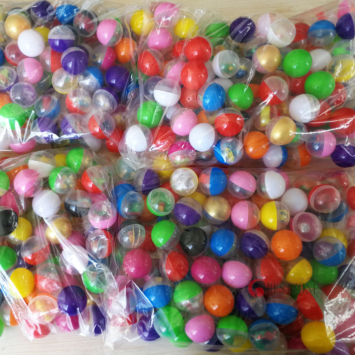 45mm huevo retorcido mezclado 1 yuan juguete huevo retorcido juguete retorcido máquina de huevo especial 45 bola de huevo retorcido barato de bajo grado huevo retorcido