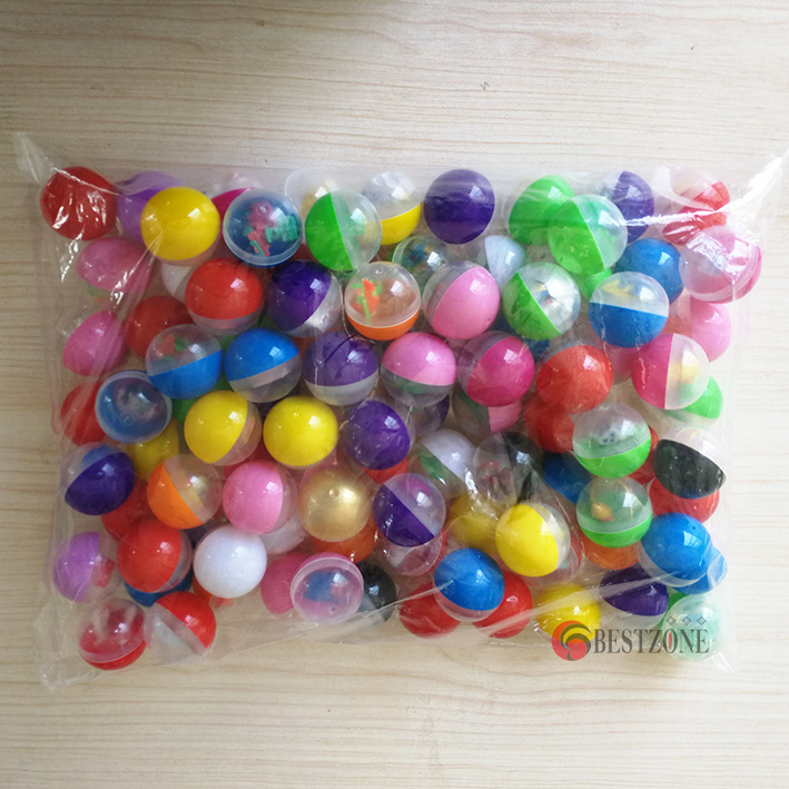 45mm huevo retorcido mezclado 1 yuan juguete huevo retorcido juguete retorcido máquina de huevo especial 45 bola de huevo retorcido barato de bajo grado huevo retorcido