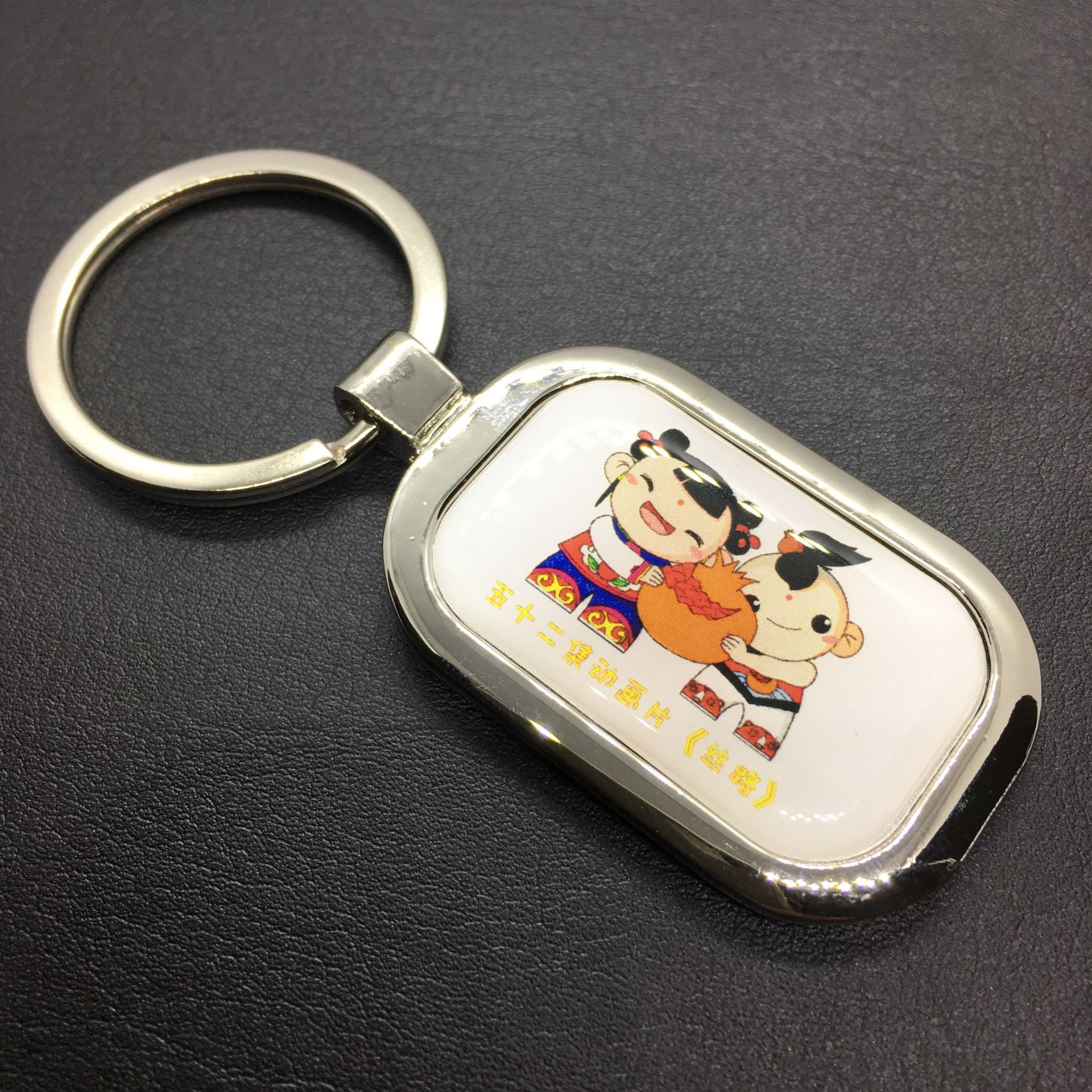 Fabricante de pegatinas de dibujos animados, llaveros de aleación de zinc epoxi, llaveros metálicos con logotipo, pequeños regalos colgantes para obsequios.