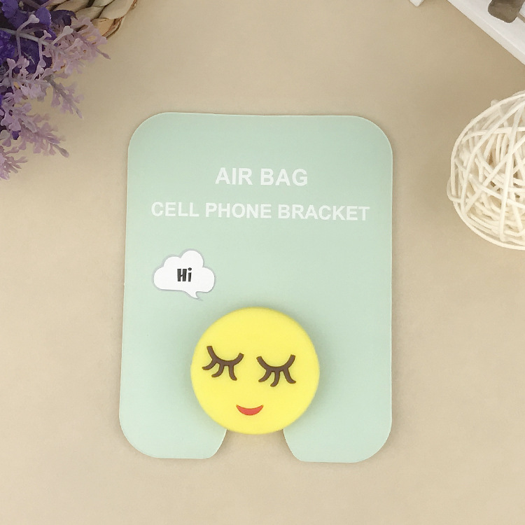En stock al por mayor TikTok Cartoon creativo soporte de teléfono móvil puede soportar airbag soporte de teléfono móvil soporte de escritorio