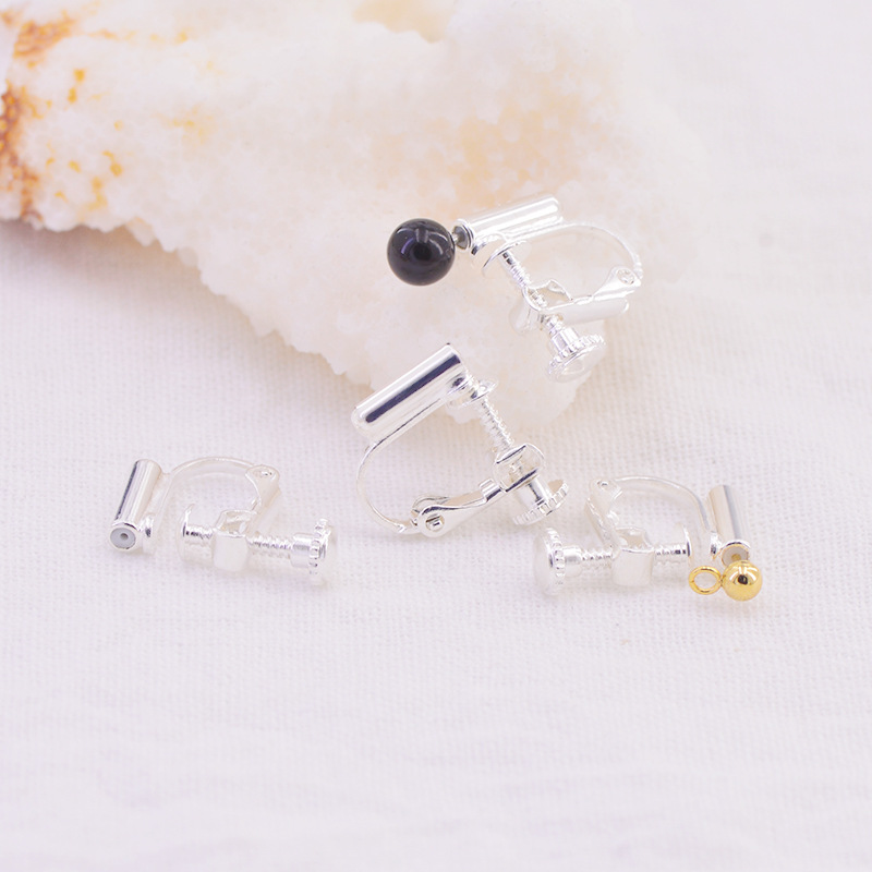 Screw ear clips have holes/silver