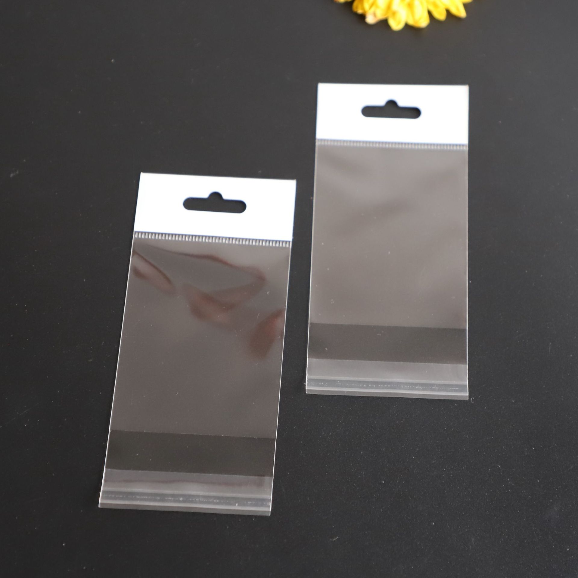 定制印刷LOGOOPP渔具包装袋加厚珠光膜飞机孔白色挂孔袋美甲袋