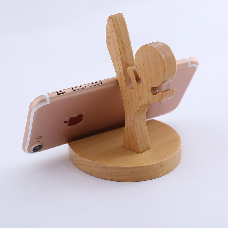 Soporte de teléfono móvil de madera Kung Fu Boy soporte para teléfono móvil soporte perezoso soporte de madera maciza creativa libre grabado LOGO