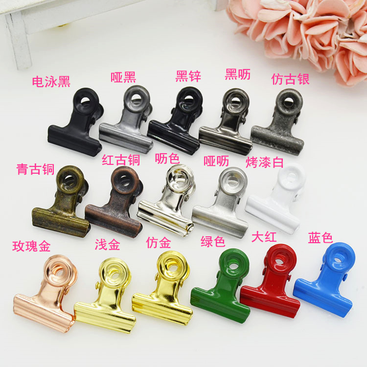 Los fabricantes suministran un gran número de en stock 22mm ronda clip Bill clip metal archivo hierro clip muestra gratis