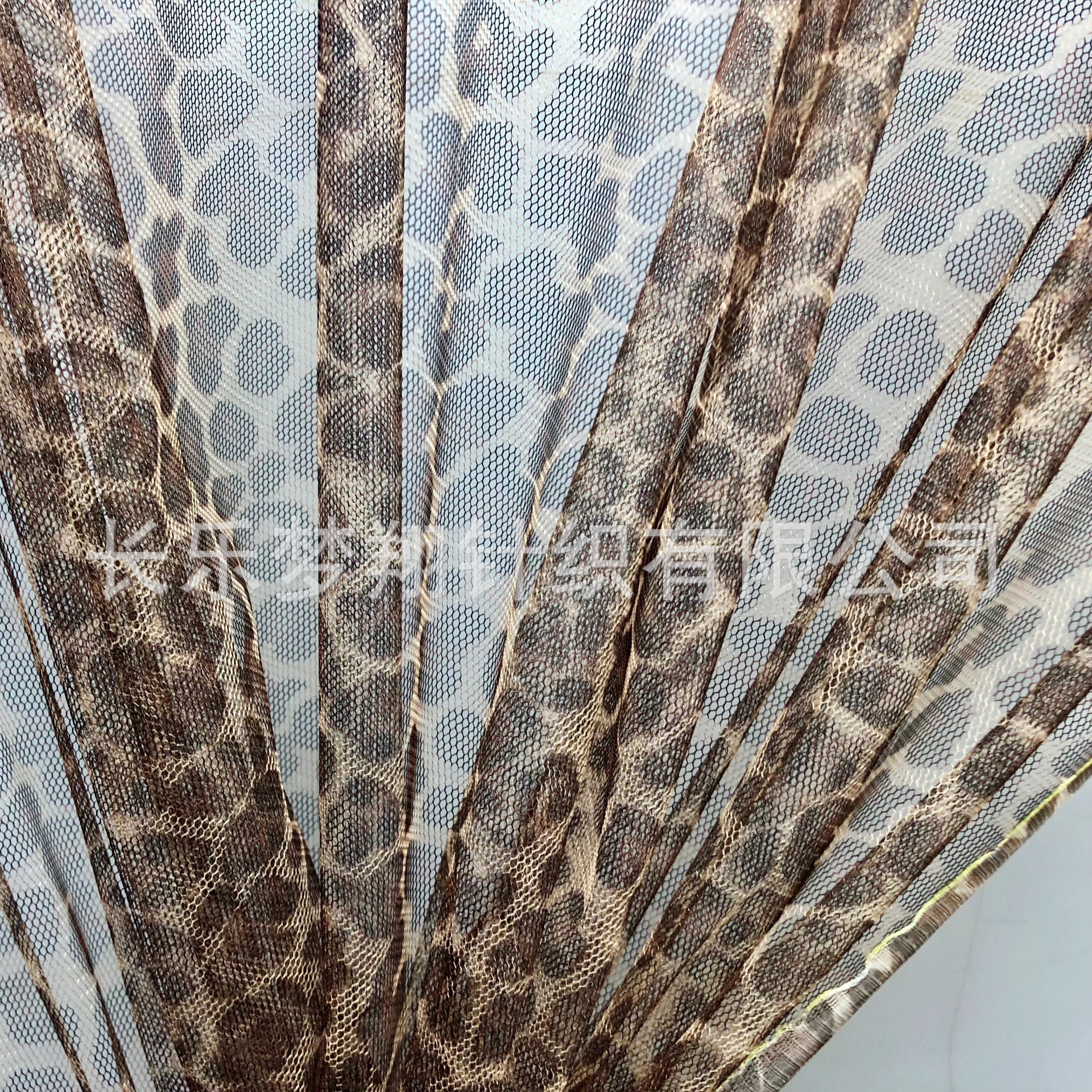 厂家供应 40a印花豹纹网纱网眼布 韩版女式女装童装裙子面料