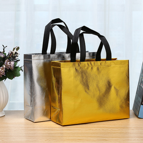 Manufacturer's gold and silver color foldable non-woven fabric tote bag, printed and laminated non-woven bag, laser bag, gift bag