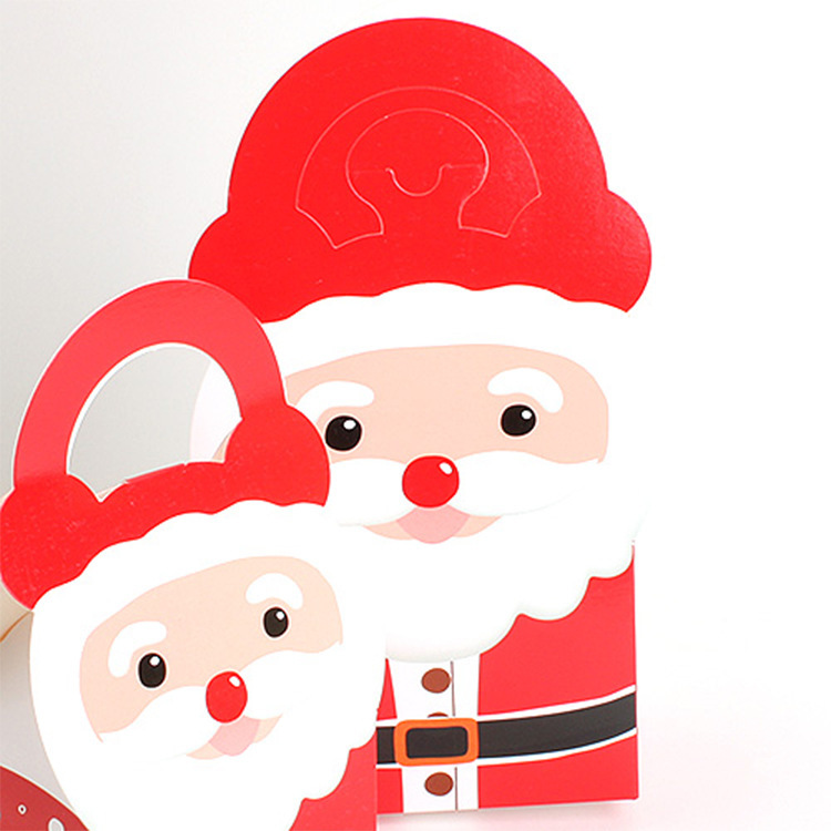 現物サンタクロースがキャンディー紙箱を持って赤いクリスマスハロウィーン専用キャンディープレゼント包装箱を卸売りする|undefined