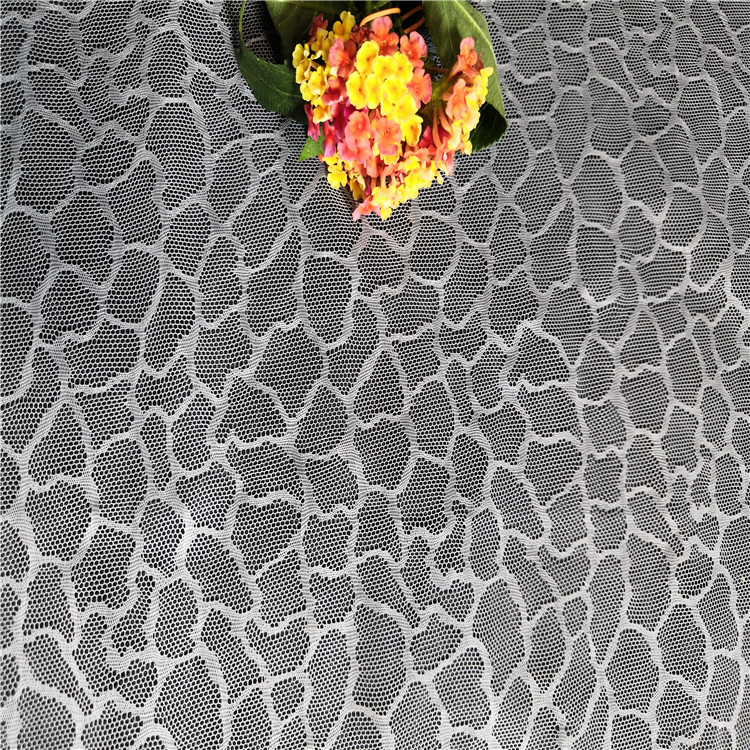 几何图经编提花网布 时装面料全涤网布 礼服绣花面料