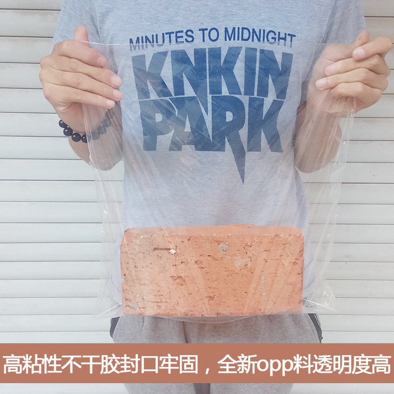 OPP bolsa al por mayor de gran tamaño pequeño bolsa de embalaje de plástico transparente impresión engrosada ropa bolsa autoadhesiva con agujero