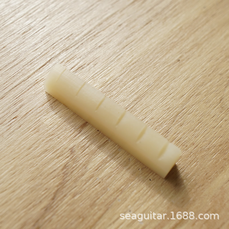 Hueso de buey natural Camel hueso piano almohada puente folk guitarra cuerda almohada ukulele adecuado para Martin estilo