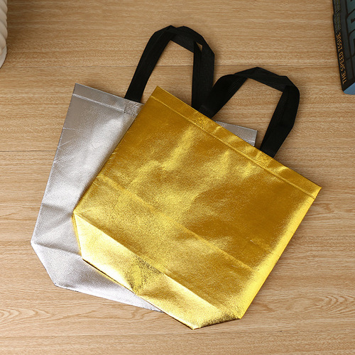 Manufacturer's gold and silver color foldable non-woven fabric tote bag, printed and laminated non-woven bag, laser bag, gift bag