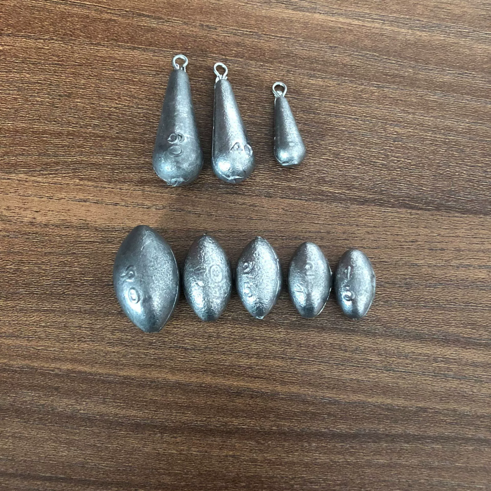 Оливково-образный сердце свинца кулон реплики свинца кулон сердце строки свинца шишка бросать стержень полые капли воды висит кольцо свинца кулон оптом