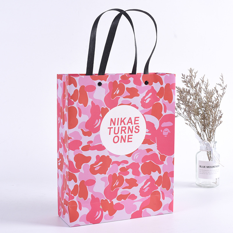 创意广告服装手提袋定 做购物礼品袋印刷牛皮纸袋编纸绳白卡定 制