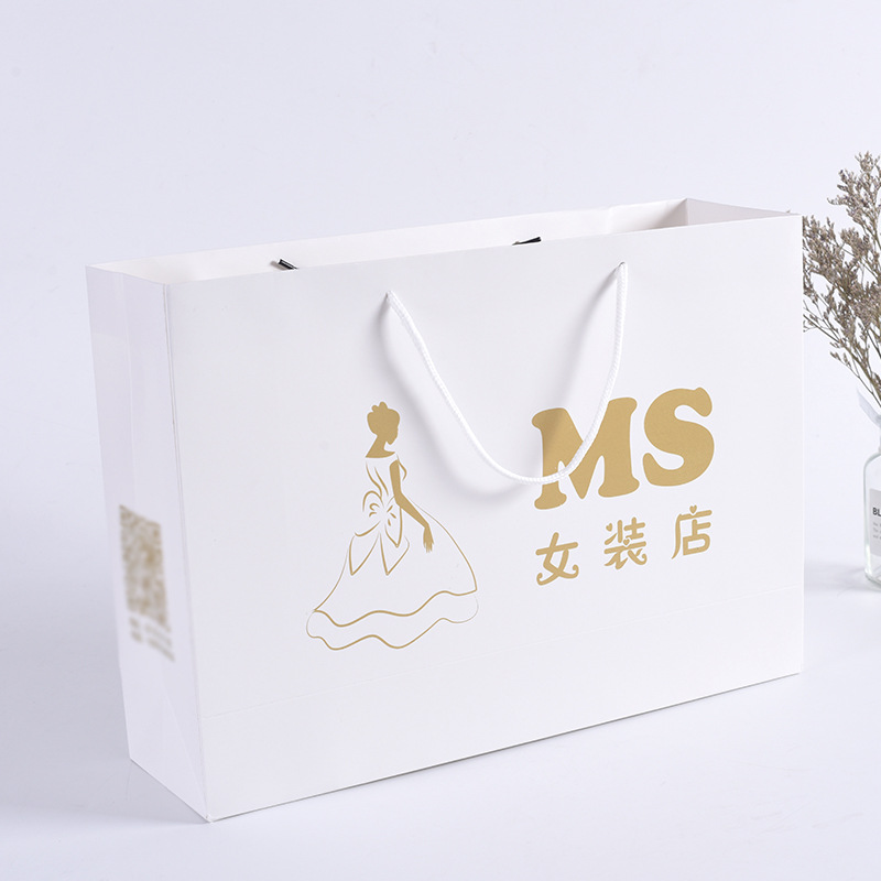 牛皮纸手提礼品袋定 制包装袋 服装白卡纸袋定 制印刷logo广告购