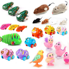 Classic nostalgic cartoon toys for kids: rocking mouse, chick, fish, tin frog, and wind-up caterpillar—small, charming mechanical toys.