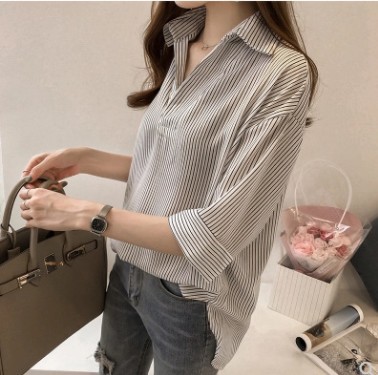 2023 verano nuevo estilo coreano suelta adelgazante camisa a rayas de manga tres cuartos versátil camisa casual moda